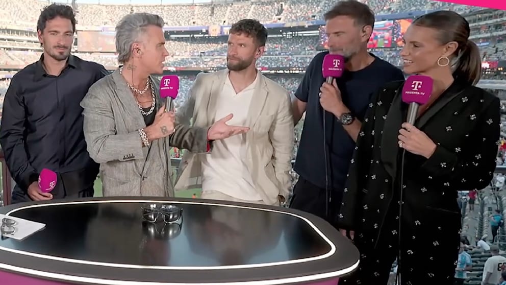 Kurioser Moment nach dem WM-Finale: Müller und Robbie Williams